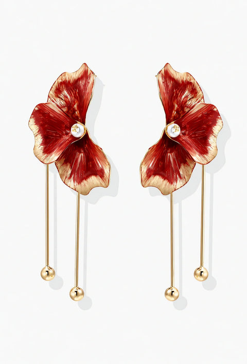 Pair of gold plated eco-brass flower earrings with red enamel petals, a round MOP bead center and long ball-tipped bars.