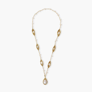 14K gold plated necklace with organic leaf motifs and freshwater pearls arranged in an elegant chain design on neutral background.