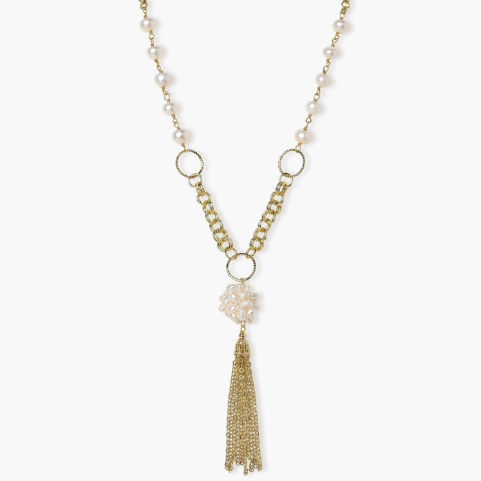 Long gold-plated necklace with freshwater pearls, chunky chain links, and flowing tassel pendant