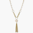 Long gold-plated necklace with freshwater pearls, chunky chain links, and flowing tassel pendant