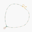 Beaded necklace with baroque pearls, turquoise stones, and gold accents featuring a large pearl pendant on white background.
