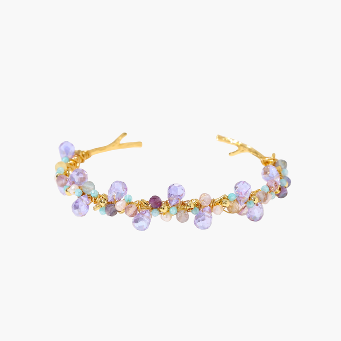 Gold-plated adjustable cuff bracelet with clustered lavender fluorite, turquoise beads, and freshwater pearls on white background.