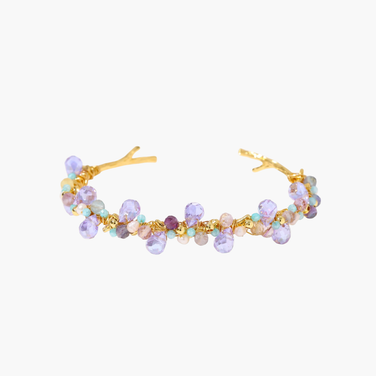 Gold-plated adjustable cuff bracelet with clustered lavender fluorite, turquoise beads, and freshwater pearls on white background.