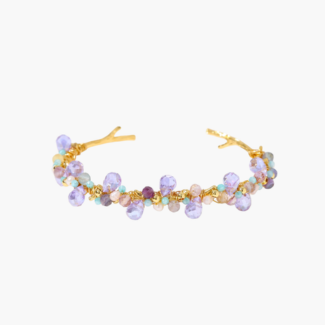 Gold-plated adjustable cuff bracelet with clustered lavender fluorite, turquoise beads, and freshwater pearls on white background.