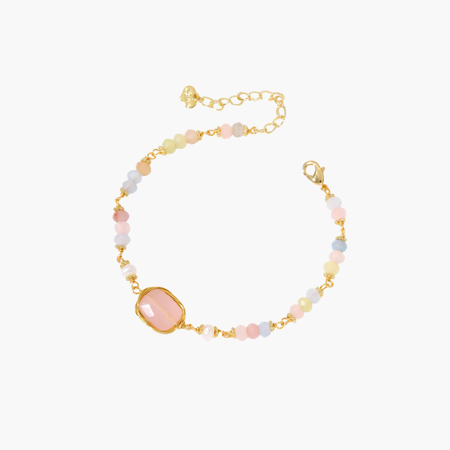 Delicate beaded bracelet with pastel rose quartz, pearls, and pink cushion-cut centerpiece in gold-plated setting