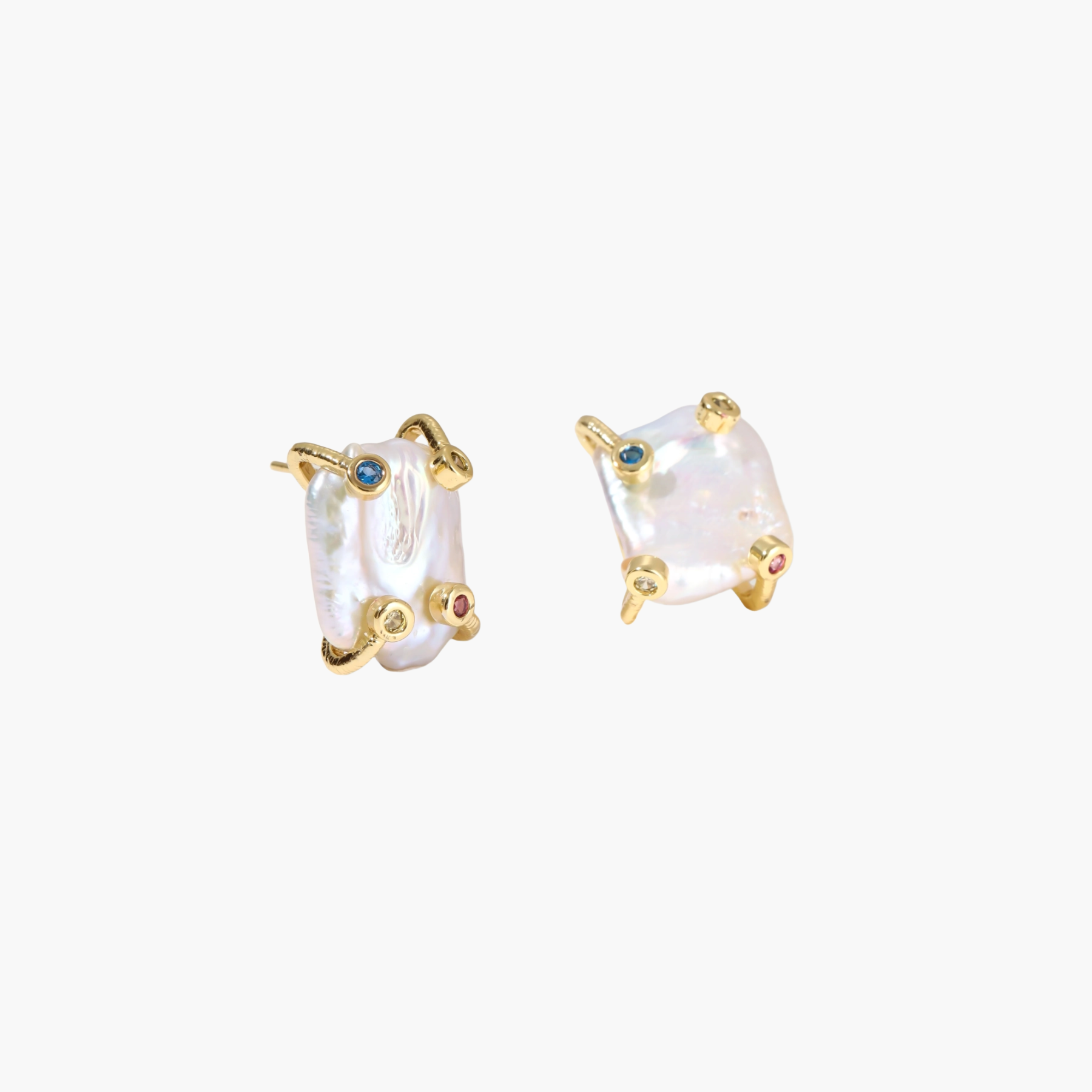 Baroque pearl studs in gold-plated prong setting with four multicolor gemstones on each corner, front and side view