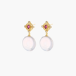 Gold baroque pearl earrings with pink gemstone studs and ornate detailing on cream background.