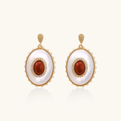 Gold-plated drop earrings with layered oval mother-of-pearl and cognac gemstone center framed by crystal halo