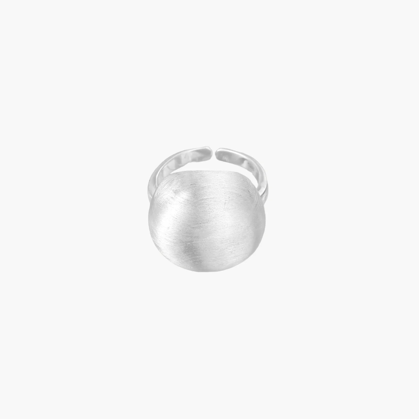 Minimalist brushed sterling silver dome ring with adjustable band on white background, front view.