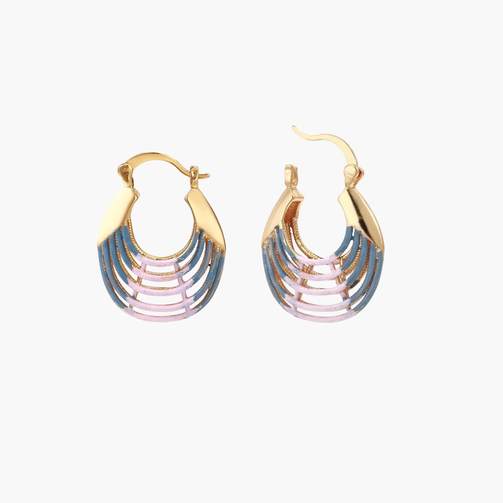 Gold hoop earrings with gradient blue-to-pink enamel in ribbed fan design on beige background