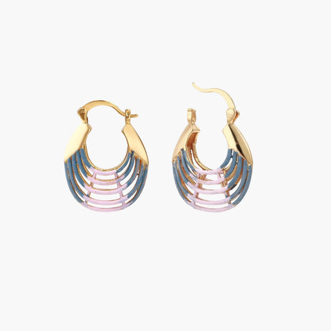 Gold hoop earrings with gradient blue-to-pink enamel in ribbed fan design on beige background