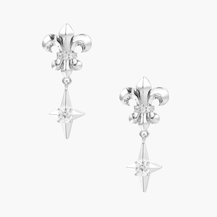 Silver fleur-de-lis drop earrings with geometric star and central crystal on white background