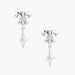 Silver fleur-de-lis drop earrings with geometric star and central crystal on white background
