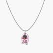 Translucent pink skull pendant with silver bow detail on delicate white gold plated chain against cream background
