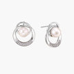 White gold-plated brass earrings with circular design, freshwater pearl center, and diamond accents