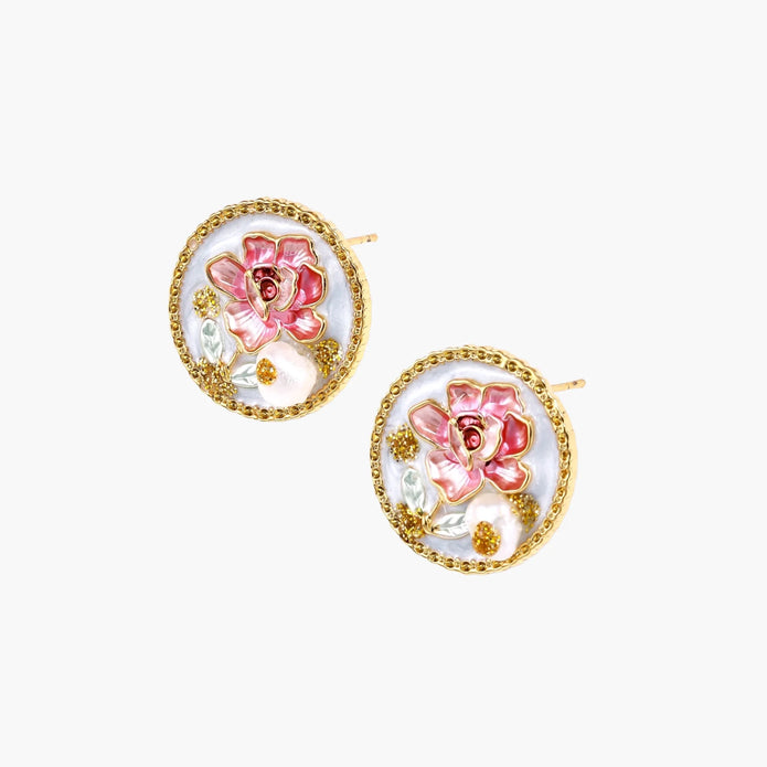 Gold-rimmed circular stud earrings with hand-painted pink peony enamel and pearl accents on white background