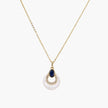 Gold necklace with navy lapis lazuli stone and iridescent mother-of-pearl teardrop pendant with crystal accents