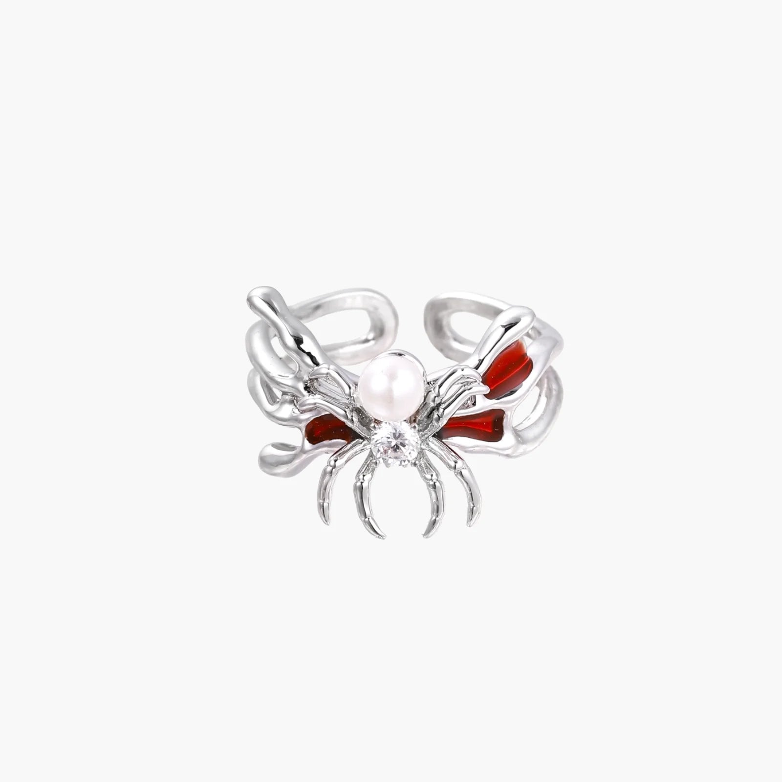 White gold plated spider ring with pearl body, clear zirconia center, and red enamel leg accents on adjustable band