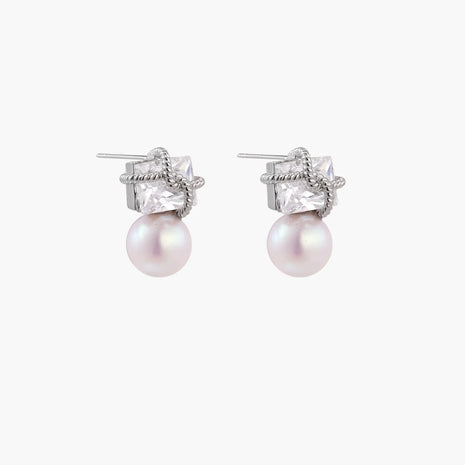 White gold stud earrings with square crystal stones in twisted frames and pink freshwater pearl drops below