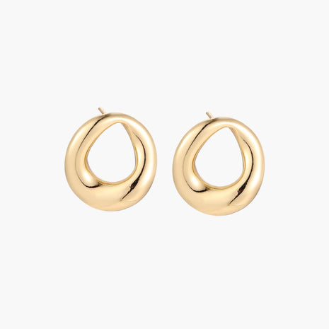 Pair of polished 18K gold-plated stainless steel teardrop earrings with hollow centers on cream background