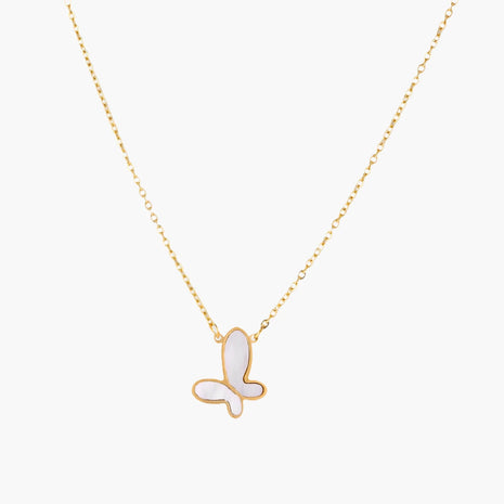 Gold-plated butterfly pendant with iridescent mother of pearl inlay on delicate chain against cream background.
