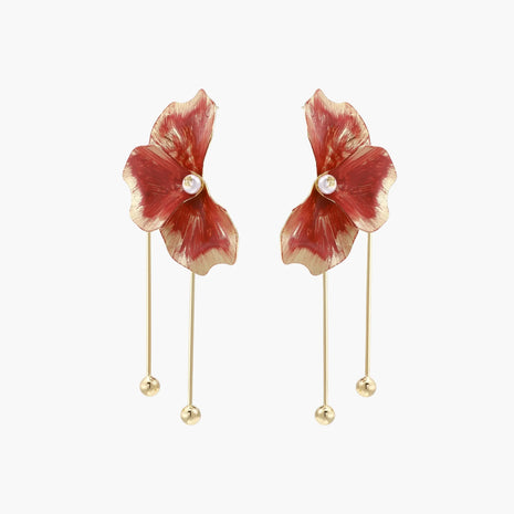 Red enamel flower earrings with gold-plated stems, central pearl, and gradient coral-to-gold petals on white background