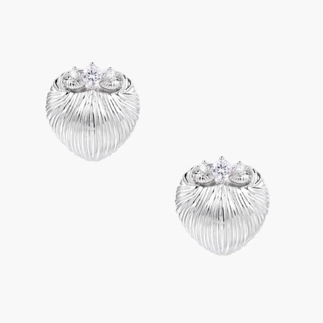 White gold-plated shell-textured stud earrings with three zirconia crystals on ridged surface against cream background.