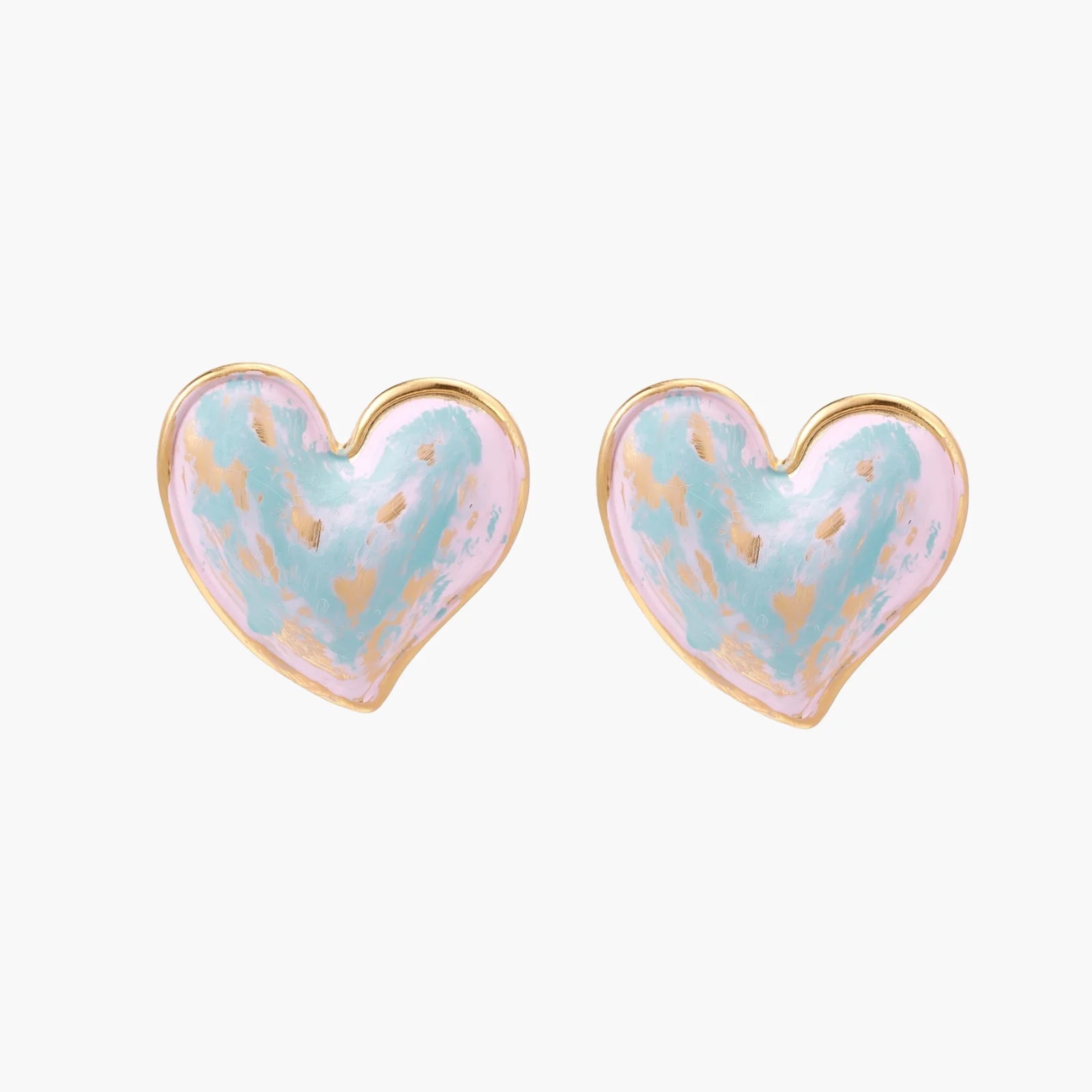 Heart-shaped stud earrings with swirled turquoise and pink enamel in gold-plated frames on cream background