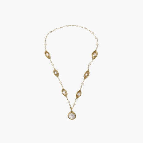 14K gold-plated necklace with eye-shaped stations and baroque pearl pendant on cream background