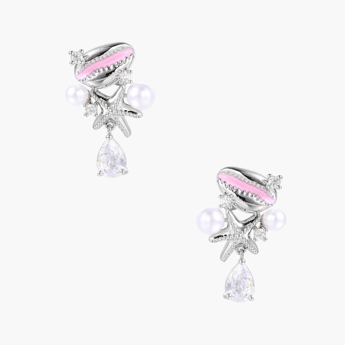 Coastal earrings with enamel cowrie shell, white pearls, starfish charm, and teardrop crystal on silver-toned metal
