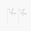 Delicate sterling silver dragonfly earrings with textured wings and curved threader hooks on white background