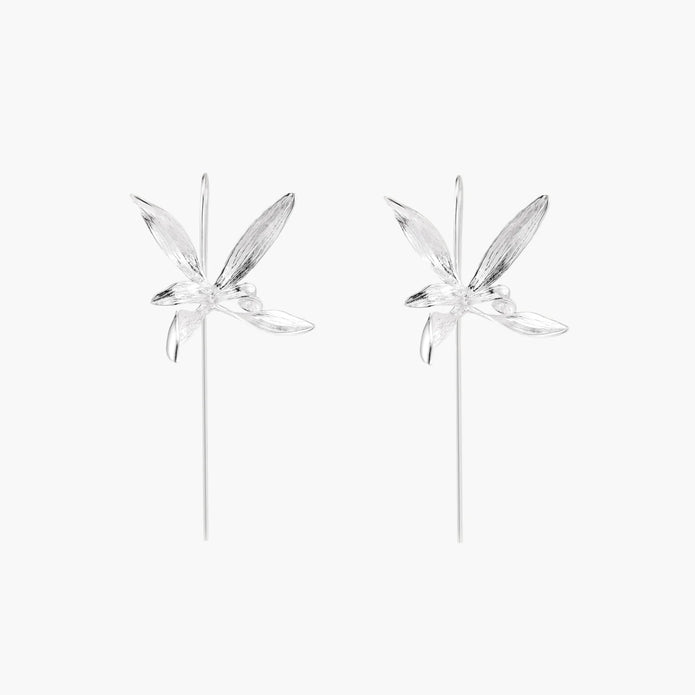 Delicate sterling silver dragonfly earrings with textured wings and curved threader hooks on white background