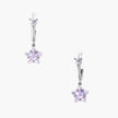White gold plated huggie earrings with clear CZ accents and dangling lavender star-shaped crystals on cream background