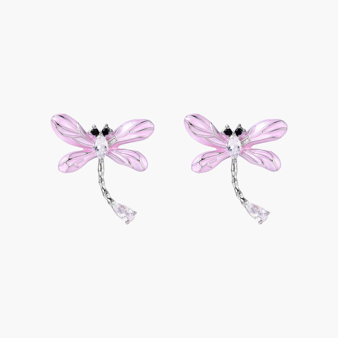 Long drop earrings with translucent lavender enamel dragonfly wings and white gold plated segmented bodies on white background