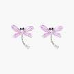Long drop earrings with translucent lavender enamel dragonfly wings and white gold plated segmented bodies on white background