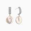 Rhodium-plated silver curved stud with pave stones and baroque pearl drop on white background