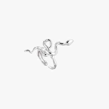 Sculptural white gold-plated snake ring with crystal accents coiling around finger in bold open design