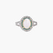 Vintage-style cocktail ring with luminous cat's eye center stone surrounded by turquoise and crystal double halo on white gold plated band