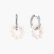 Rhodium-plated silver hoop earrings with freshwater pearls arranged in crescent formation and diamond accents