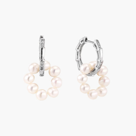 Rhodium-plated silver hoop earrings with freshwater pearls arranged in crescent formation and diamond accents