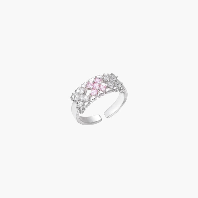 White gold plated adjustable ring with three rows of square zirconia stones in black or pink chevron pattern