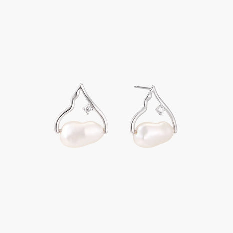 Silver mountain outline studs with baroque pearl and diamond accent on white background