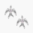 White gold-plated bird earrings with spread wings and oval zirconia center on cream background