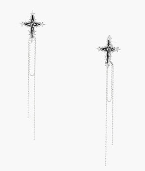 Long silver threader earrings with ornate cross-star design and delicate dual chain tassels on white background