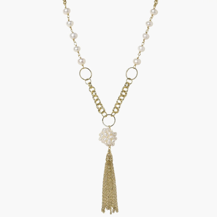 Long gold-plated necklace with freshwater pearls, chunky chain links, and flowing tassel pendant