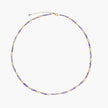 Delicate 18K gold vermeil necklace with alternating lavender zirconia beads and white freshwater pearls on cream background