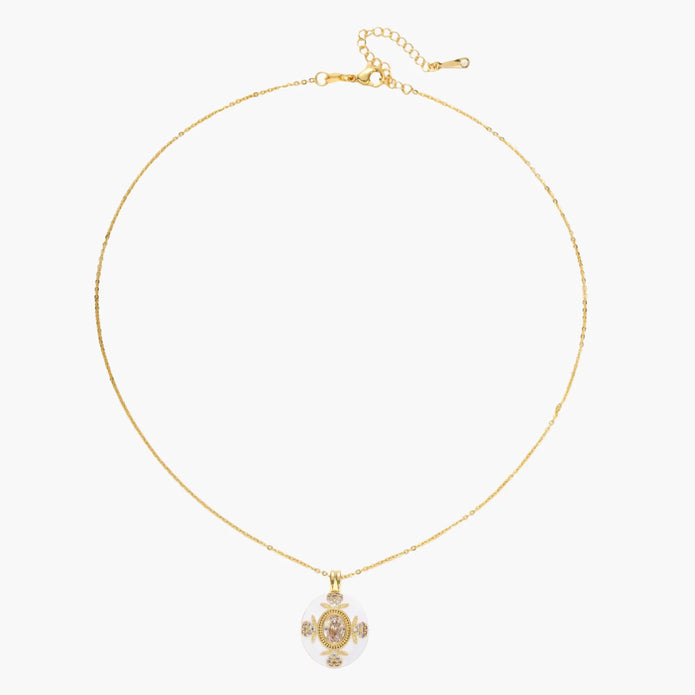 Gold-plated necklace with circular white enamel pendant featuring central zirconia stone and ornate decorative details