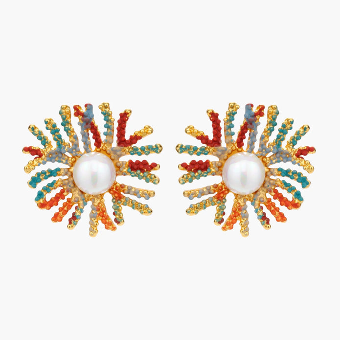 Vibrant starburst stud earrings with multicolor enamel rays and white pearl centers on gold-plated setting