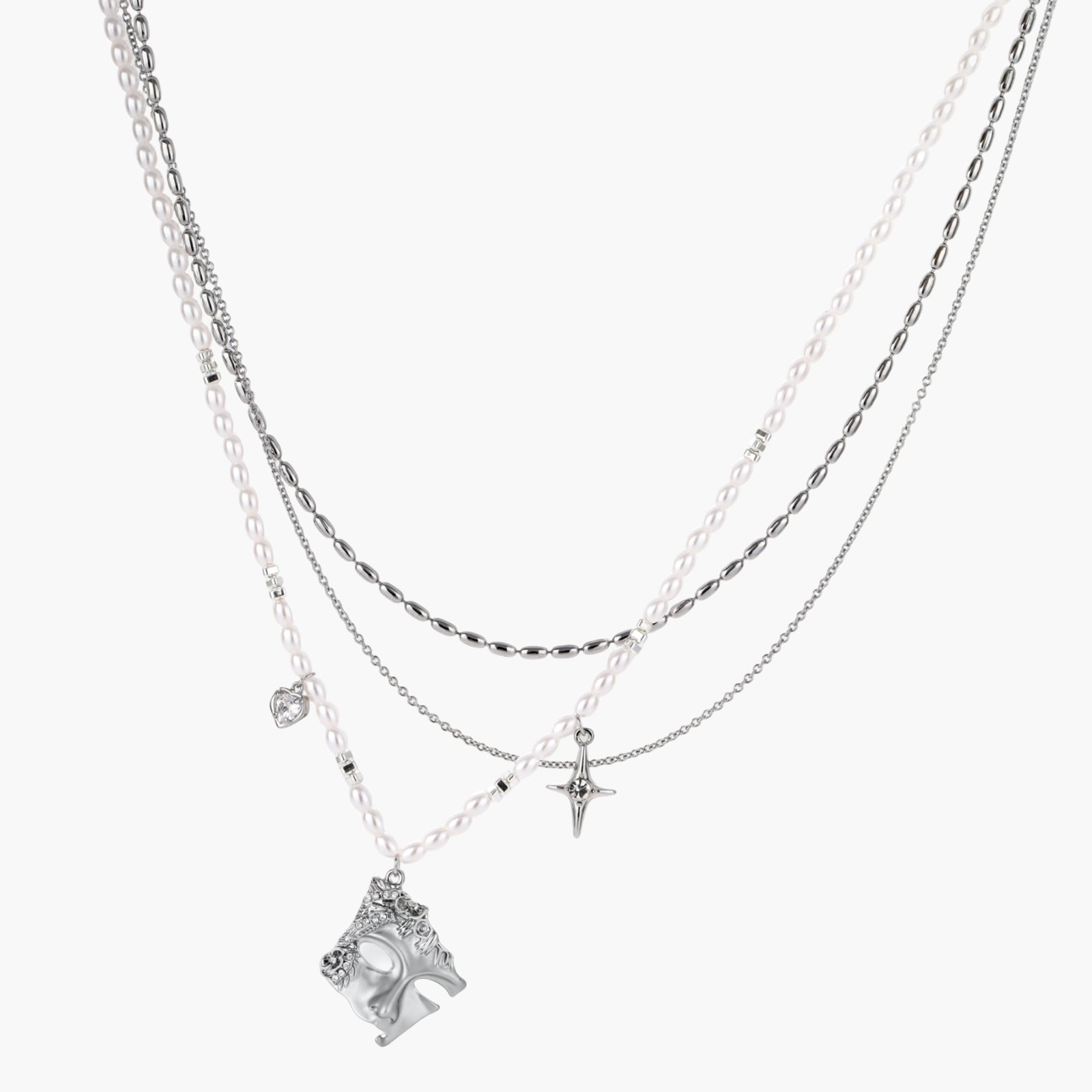 Multi-strand layered necklace set with silver chains, white pearls, star charm, heart pendant, and ornate decorative piece