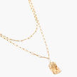 Layered paperclip chain necklace with organic flowing pendant made from eco-zinc alloy in warm gold finish
